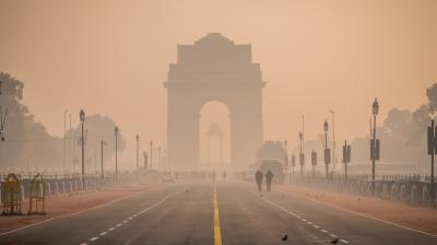 India gate in new delhi on a smoggy day.