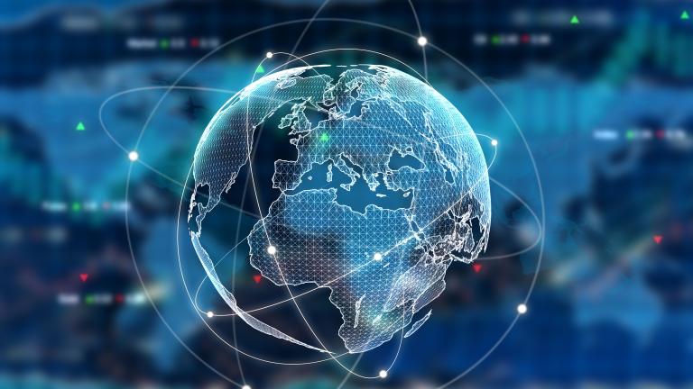 An image of a globe in the background of a business background.
