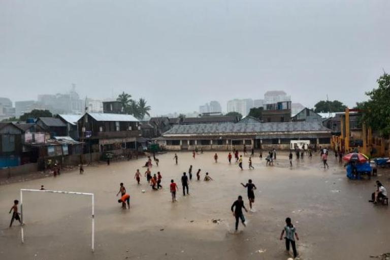Children play in monsoon flooded school in Bangladesh