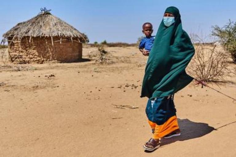 Woman with child in drought-hit Horn of Africa