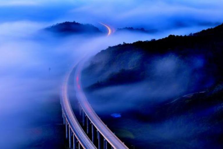 Landscape of an highway with clouds