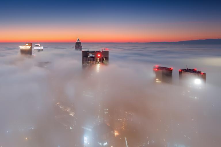 Sea of clouds with buildings