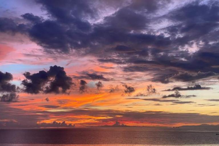 Sunset over the sea with clouds