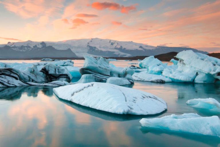 icebergs with a sunset