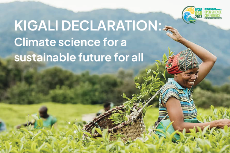 Woman smiling while working in a lush green field, promoting climate science for sustainability at the kigali declaration event.