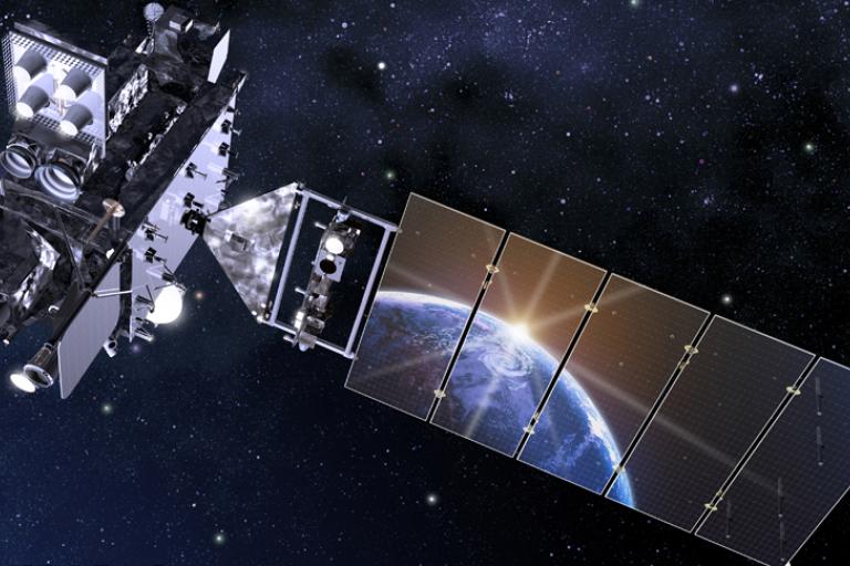 A satellite orbits Earth in space, with the planet visible in the background and solar panels extended.