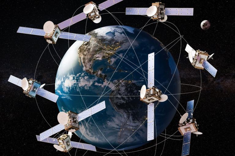 Illustration of Earth surrounded by seven satellites with solar panels, connected by lines, set against a space background with stars and a distant view of the Moon.