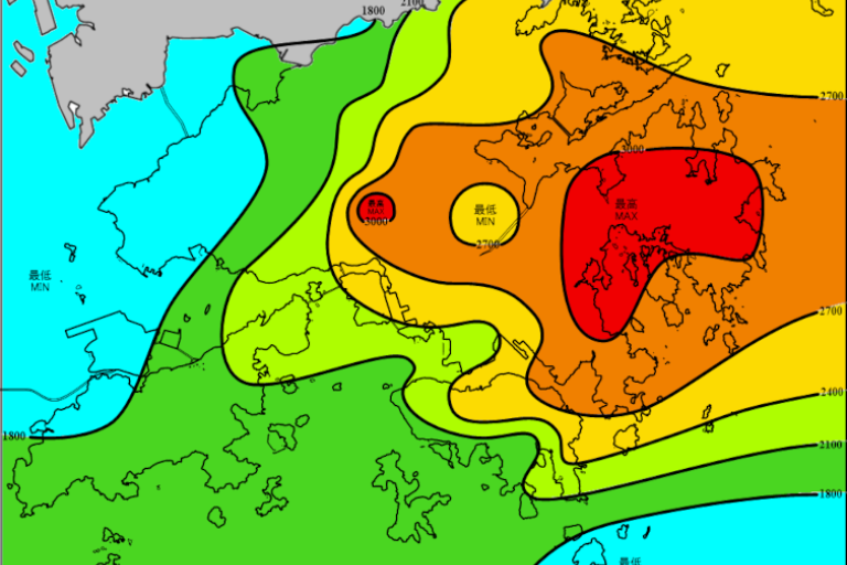 Color-coded contour map illustrating varying levels of data, with red indicating the highest and green the lowest, covering regions including parts of a coastal area. Labels are in a non-English script.