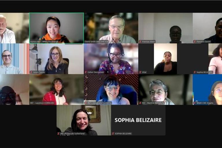 A group of people in a video conference, each in individual screen tiles, smiling and engaged. Names are displayed on the screen.