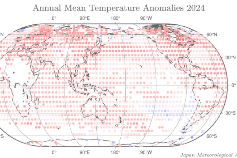 World map showing 2024 temperature anomalies, with red and blue dots indicating warmer and cooler areas, respectively. Data by Japan Meteorological Agency.