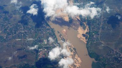 An aerial view of a river and a city.
