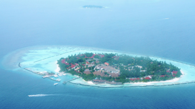 An aerial view of an island in the middle of the ocean.