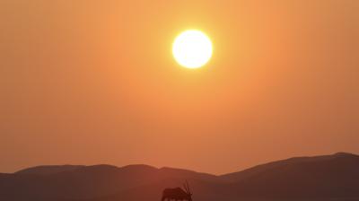 Photo by: Tim	Gray, The Sossusvlei area of Namibia, WMO 2023 calendar competition