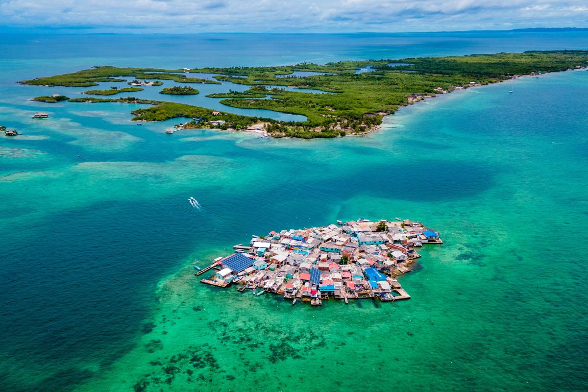 An aerial view of a small island in the ocean.