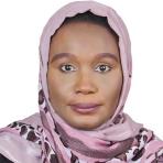 A woman wearing a light pink and brown patterned headscarf, looking directly at the camera with a neutral expression against a white background.
