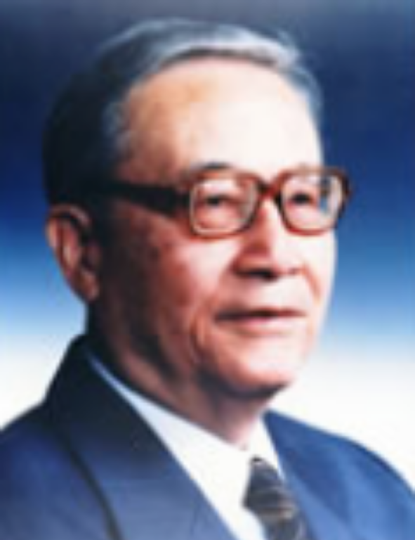 An asian man wearing glasses and a suit.