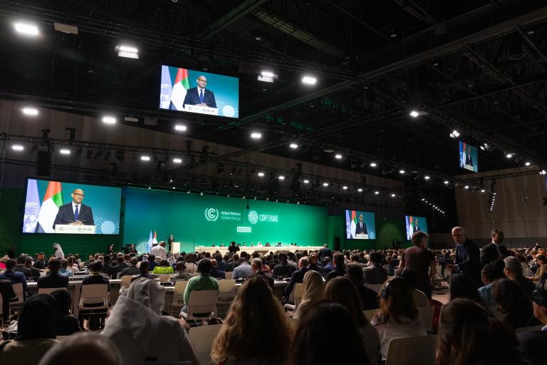 A large crowd of people at a conference.