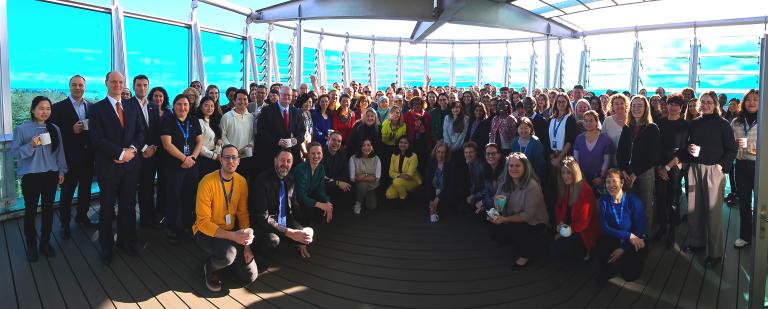 A large group of people posing for a photo.