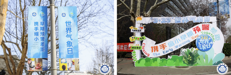 Banners and signs promote World Meteorological Day, displaying event date and early warning themes in a park setting.