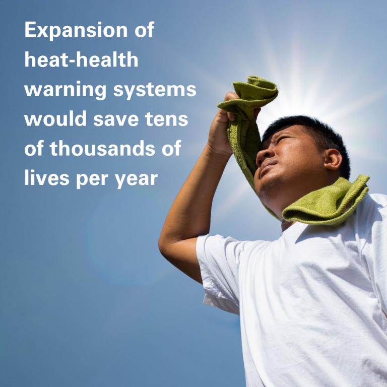A man wipes sweat from his forehead with a towel under the sun. Text beside him says expanding heat-health warning systems could save tens of thousands of lives per year.