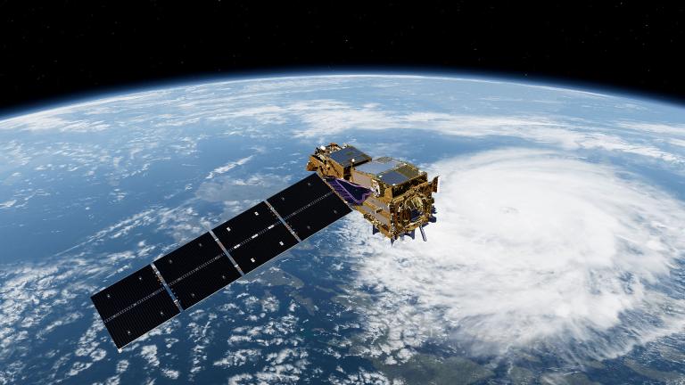 A satellite orbits above Earth, with a large swirling storm system visible over the planet’s surface below.