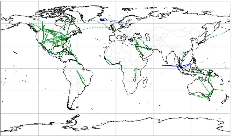 World map showing networks of submarine cables; green dashed lines represent one set of routes, and blue dashed lines represent another, connecting major continents and regions.