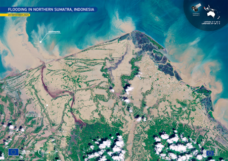 Satellite image shows widespread flooding in Northern Sumatra, Indonesia, with large areas of land submerged and mud-filled water visible, dated 21 November 2023.