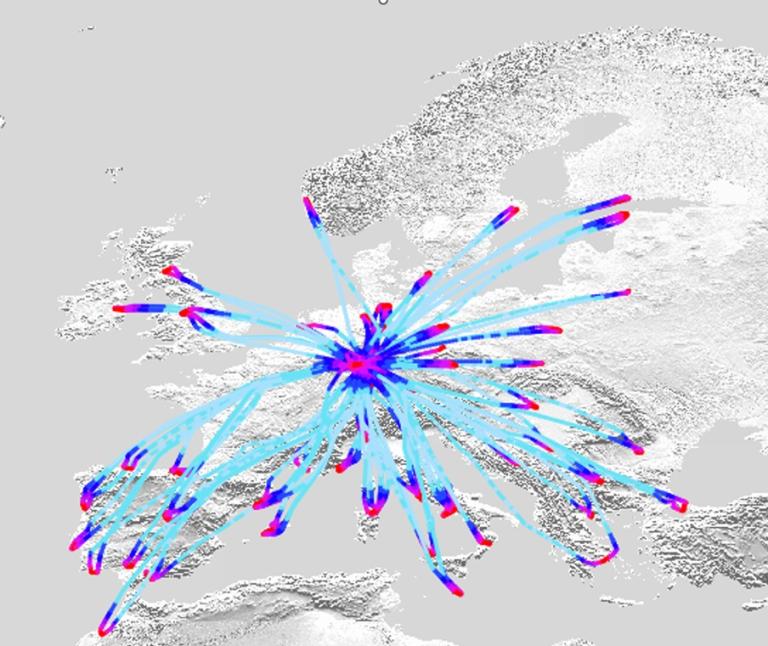 A map of Europe with blue and red lines radiating from a central point, illustrating connections or routes across the continent.