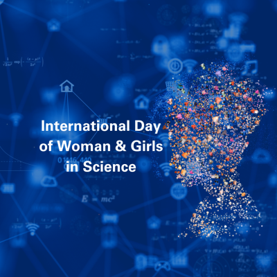 Silhouette of a woman filled with colorful particles against a blue background with text: "International Day of Woman & Girls in Science.